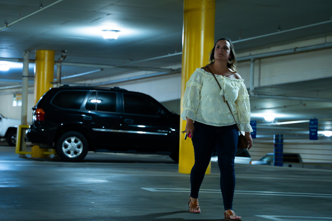 woman alert while in parking garage