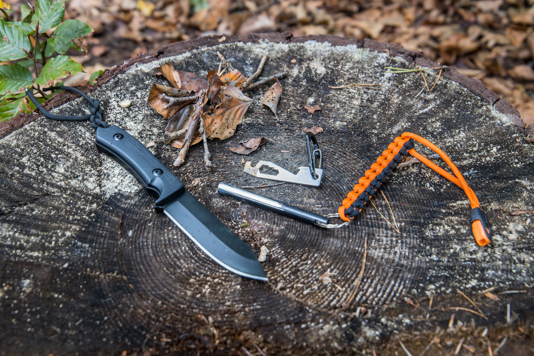 bushcraft tools include knife and multitool