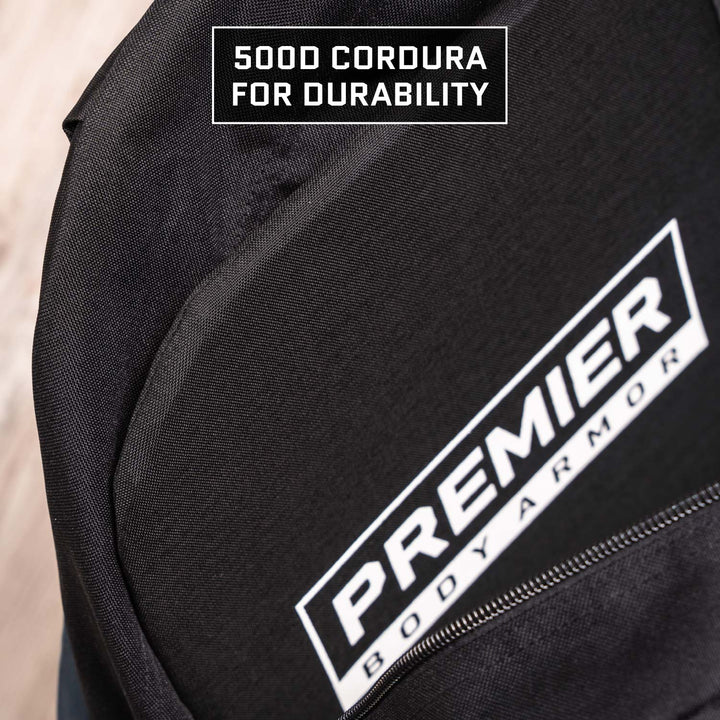 Close-up of the Premier Body Armor Level IIIA Insert for 5.11 Rush 24/72 Pack, crafted from durable 500D Cordura fabric with a visible brand label and a para-aramid ballistic core. "500D Cordura for durability" text appears at the top.