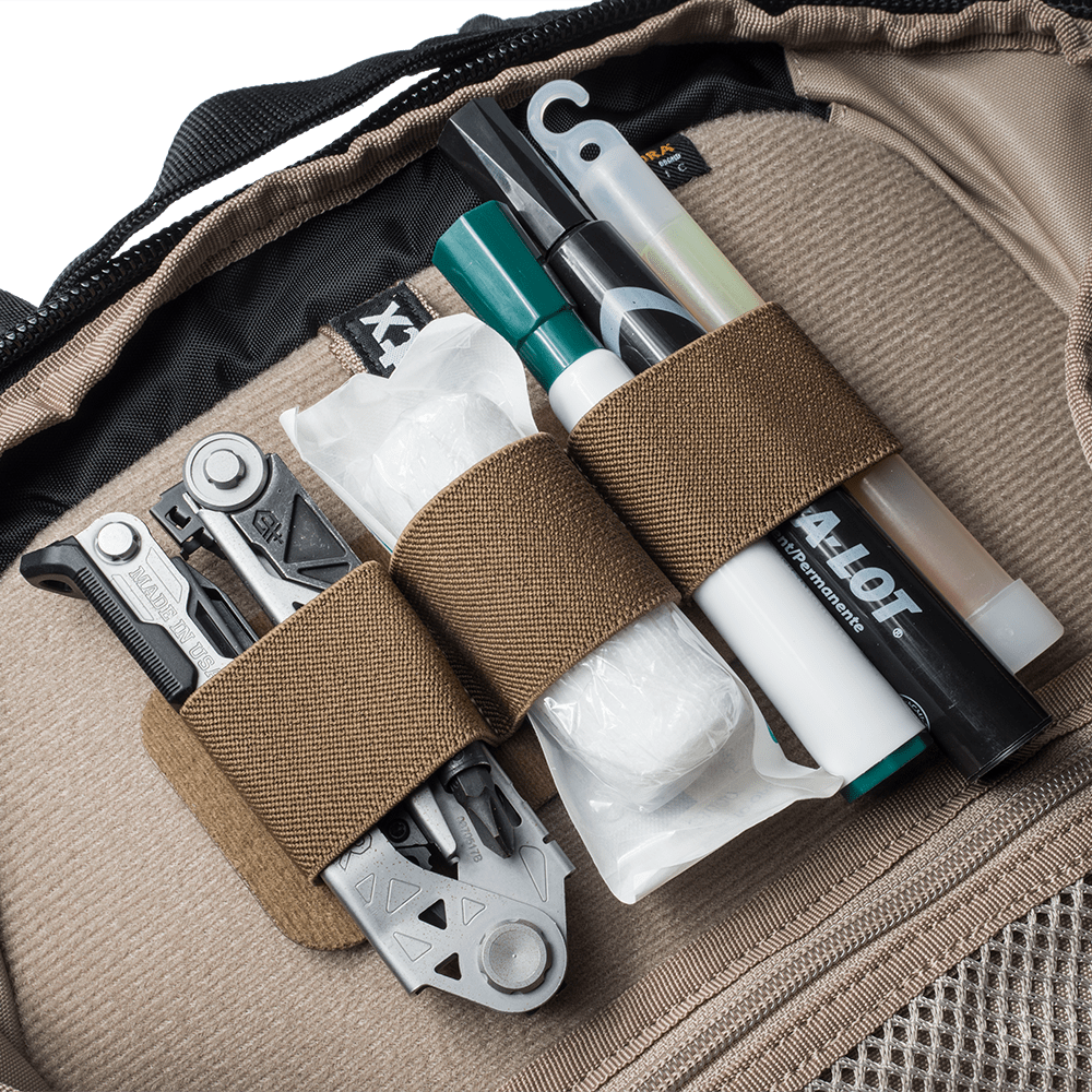 Image of MAK band full holding EDC gear in a Vertx bag and armor bundle.