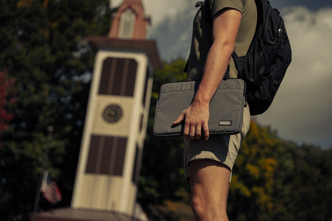 student on campus with bulletproof laptop case