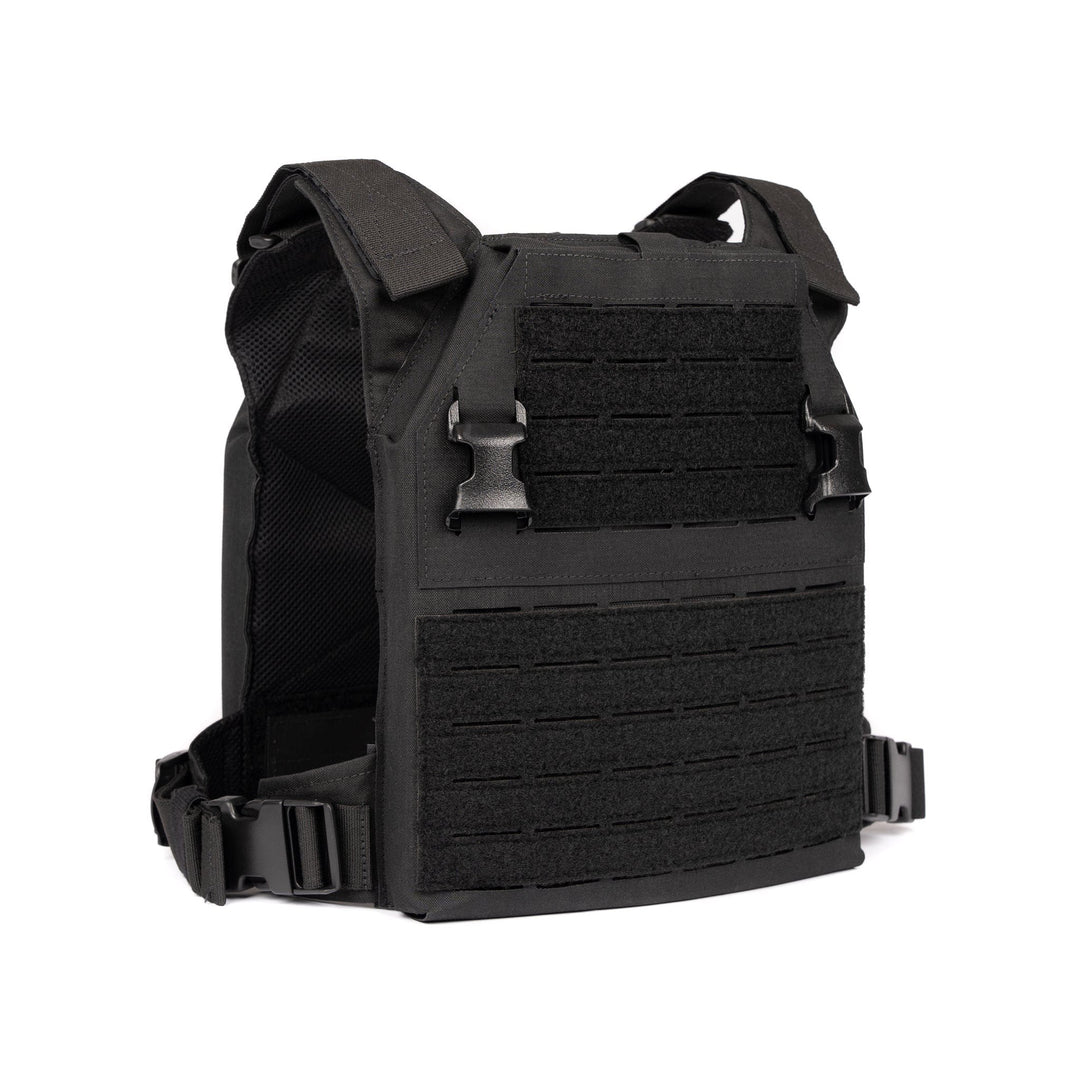 The image shows a black Premier Body Armor Fortis Level IV Loadout (old) tactical vest with MOLLE webbing on the front and adjustable shoulder straps. The vest features a mesh back, buckle closures on the sides and front, and can accommodate Level IV plates, ensuring tactical flexibility for carrying gear and providing protection.