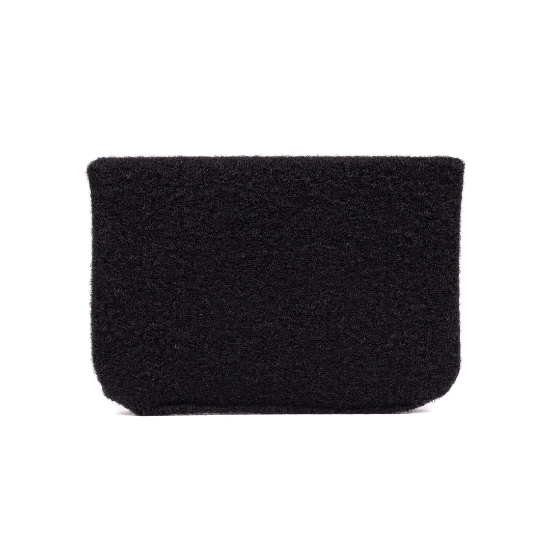 A rectangular black textured pouch, closely resembling the Premier Body Armor SOE FUPA Level IIIA Insert, is displayed against a plain white background. The pouch appears soft and fuzzy, with no visible zippers or handles.