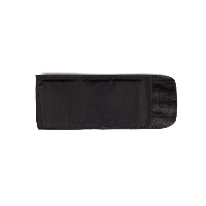 A flat, black padded Bulletproof Can Cooler from Premier Body Armor with a Velcro closure on one end, made from ballistic fibers. The cooler is plain with no visible branding or embellishments. It's laid flat against a white background.