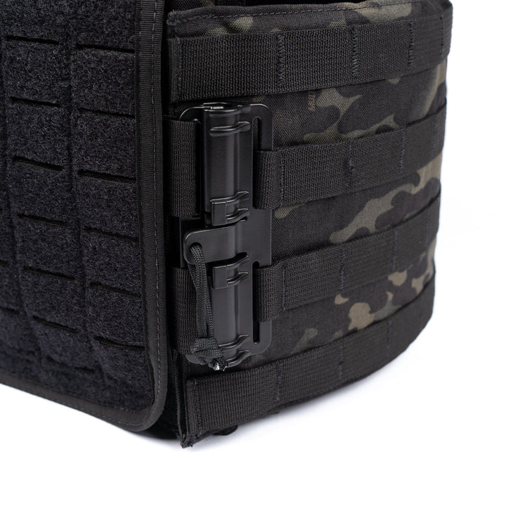 side close up of multicam black plate carrier showing molle and quick release buckle attachment