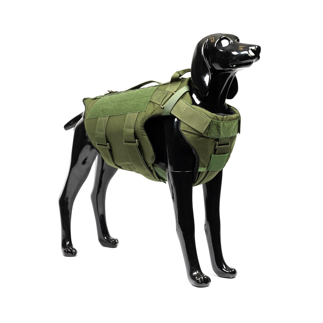 A black, glossy dog mannequin displays the OD Green "K-9 Vest – Level IIIA" by onyx/Premier Body Armor, featuring multiple straps and utility pockets which may include level IIIA ballistic panels. The setup is on a plain white background.