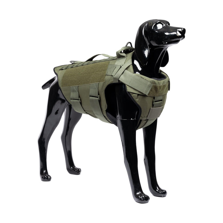 A shiny black dog mannequin wears the green K-9 Vest – Level IIIA by Onyx/Premier Body Armor, featuring adjustable straps, multiple pouches, and a top handle. It resembles level IIIA body armor and stands on all fours facing right.