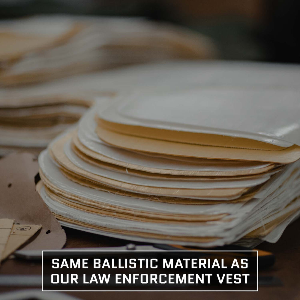 Layered ballistic materials are displayed on a table. Text at the bottom reads, "Same ballistic material as our law enforcement vest," emphasizing the durability shared with our Viktos/Premier Armored Viktos Upscale Hip Pack Bundle.