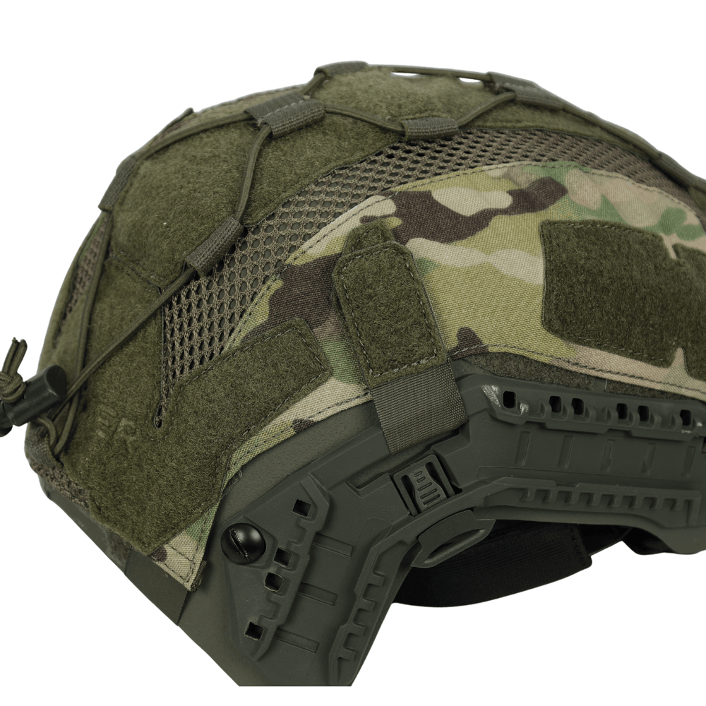 Olive drab Fortis Bump Helmet Cover featuring camouflage fabric panels, mesh sections, and exterior accessory rails.