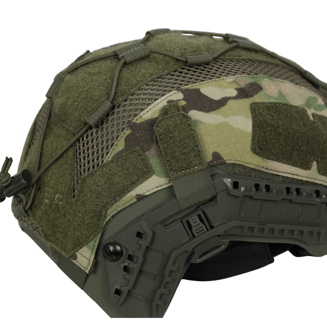 Olive drab Fortis Bump Helmet Cover featuring camouflage fabric panels, mesh sections, and exterior accessory rails.