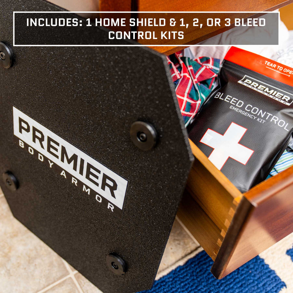 A drawer is open to reveal a Premier Body Armor Home Defense Kit, which includes a Level IIIA Home Shield and a Bleed Control emergency kit. The drawer also contains colorful patterned ties. A label at the top of the image reads: "Includes: 1 Level IIIA Home Shield & 1, 2, or 3 Bleed Control Kits.”