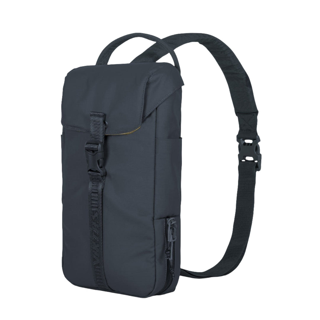 The Viktos/Premier Counteract CCW Slingbag is a black, rectangular sling bag featuring a large front flap secured by a buckle. It comes with an adjustable strap and multiple pockets, making it ideal for carrying small essentials or even a firearm. Its minimalist design can also accommodate body armor inserts for added protection.