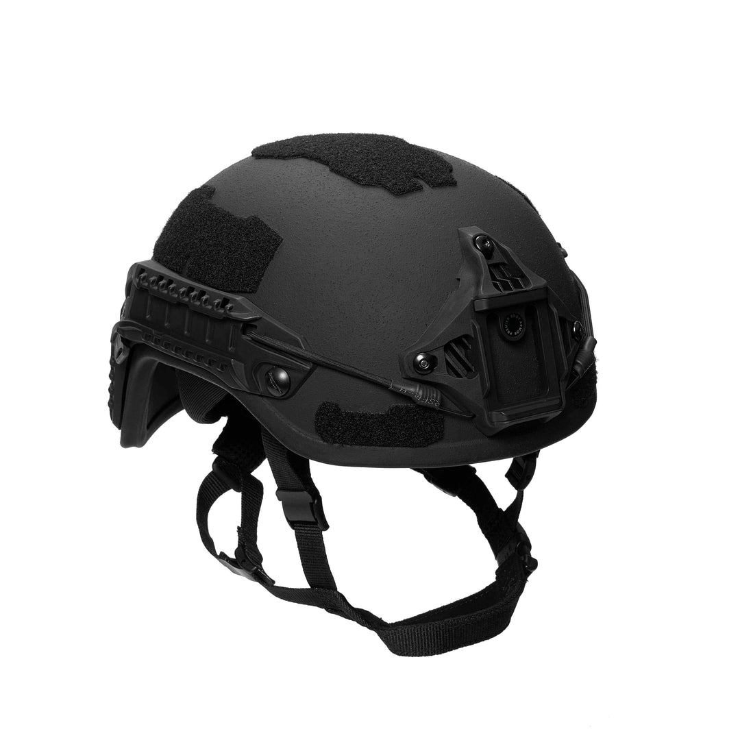 A matte black Fortis Ballistic Helmet by Premier Body Armor is displayed. It has adjustable straps, a built-in NVG mount, and velcro patches for accessories, showcasing lightweight design and advanced protective technology for enhanced performance.