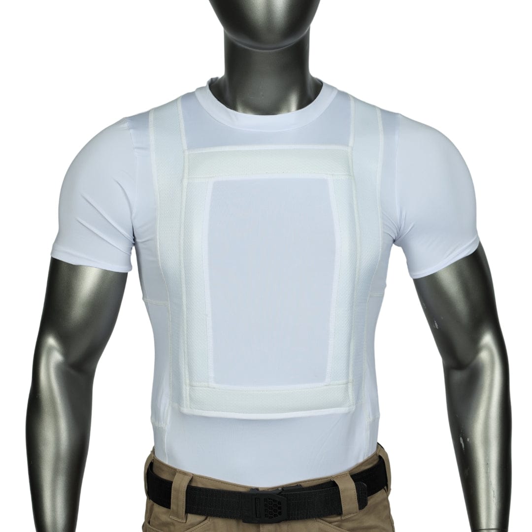 A mannequin with a metallic gray head and arms wears the Premier Body Armor Everyday Armor T-shirt 360 Core, featuring a white fitted design and rectangular padded Level IIIA panel, paired with beige pants and a black belt.
