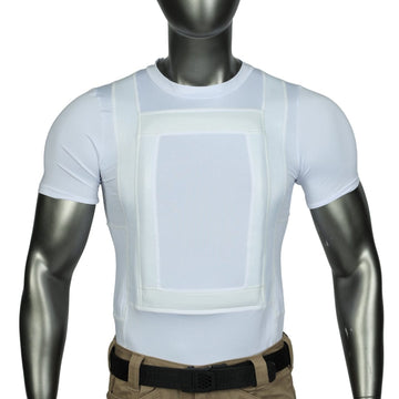 A sleek, metallic mannequin wears the Premier Body Armor Old Everyday Armor T-shirt 360 Core, showing its rectangular concealed armor panel, tucked into tan pants with a black belt.