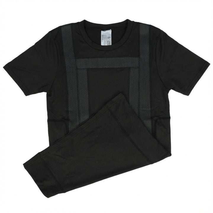 The Premier Body Armor Extra Carrier - Everyday Armor T-Shirt 360, a black short-sleeve shirt with two vertical and one horizontal textured stripe, is neatly folded next to matching black pants. Ideal as a body armor carrier.