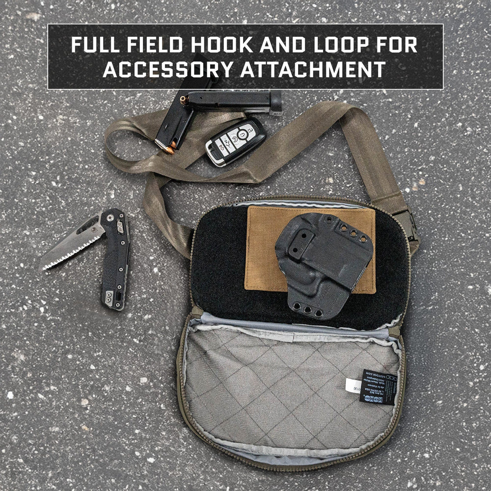 A textured surface displays a tan tactical pouch with an adjustable strap, partially open to reveal storage. Nearby are an Eberlestock Fade Flex Level IIIA Insert from Premier Body Armor, a folding tool, and a black holster. Text reads, "Full field hook and loop for accessory attachment.