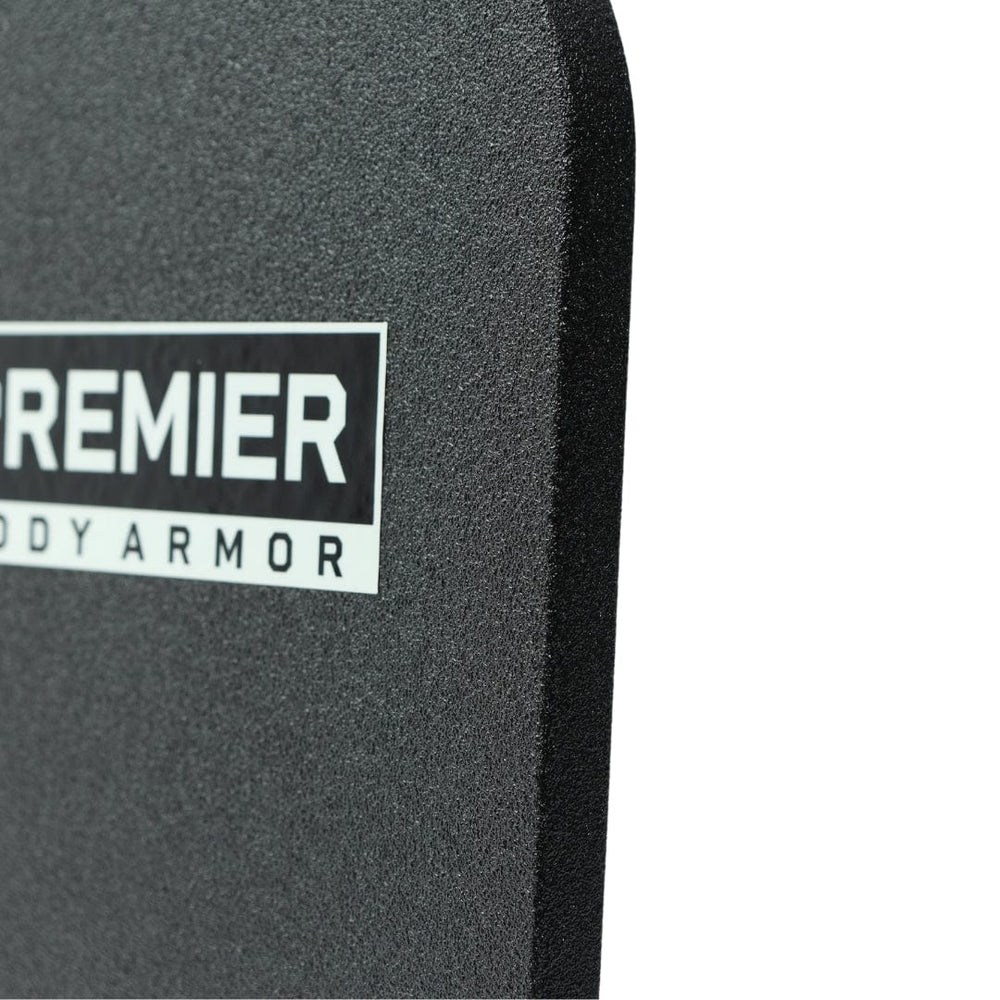 A close-up of a black, textured armor panel labeled "Premier Body Armor," partially cropped. Shown is the 10x15 Special Threat Rifle-Rated Backpack Insert by Premier Body Armor, designed for use as an NIJ ballistic backpack insert.