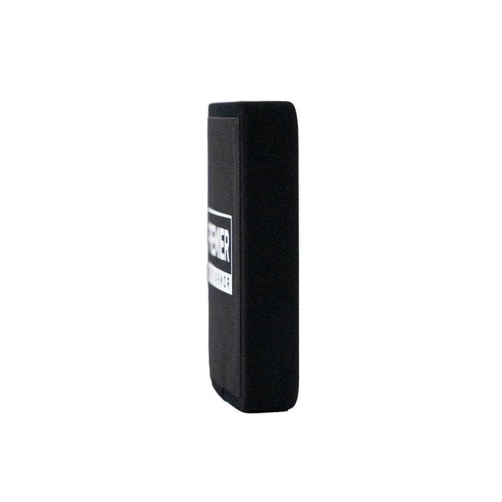 A side view of the black rectangular Fortis III+/RF1 Side Plate Set by Premier Body Armor, featuring a white logo, is set against a plain white background, highlighting its sleek design and reliability.