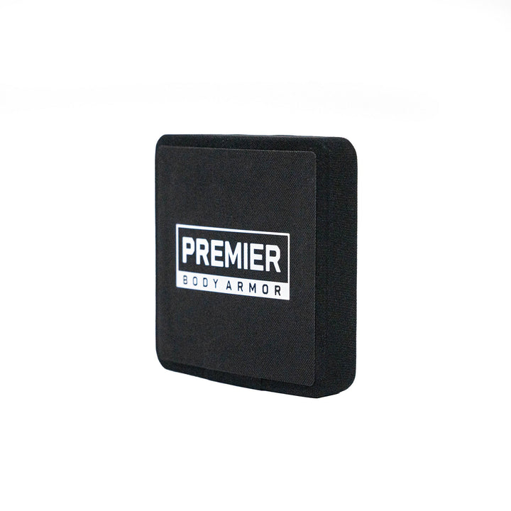 A Fortis III+/RF1 Side Plate Set by Premier Body Armor in black, symbolizing reliability, isolated on a white background.