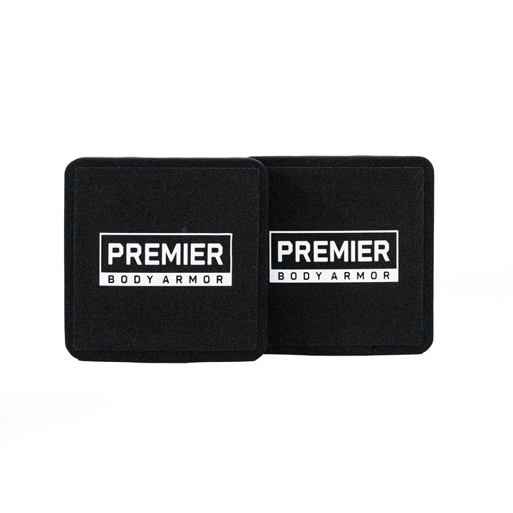 The Fortis III+/RF1 Side Plate Set, featuring two black square panels with "Premier Body Armor" in white, is displayed side by side on a white background, representing reliability and meeting top body armor standards.