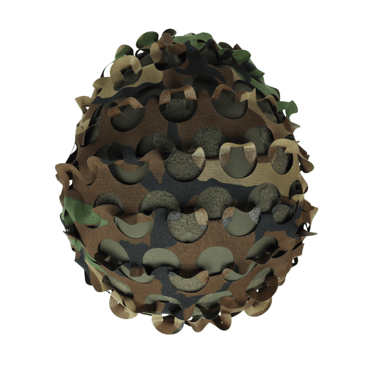 The OPE Gear Helmet Scrim - Camo Helmet Cover by OPE Gear features overlapping, camouflage-patterned cutouts with irregular edges for a layered, tactical look in green, brown, and tan.