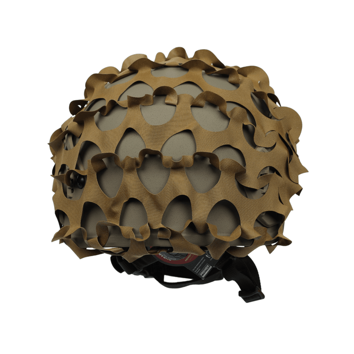 The OPE Gear Helmet Scrim - Camo Helmet Cover by OPE Gear is a tan military helmet cover made from brown Cordura with large oval openings, featuring a black strap and buckle at the base for camouflage.