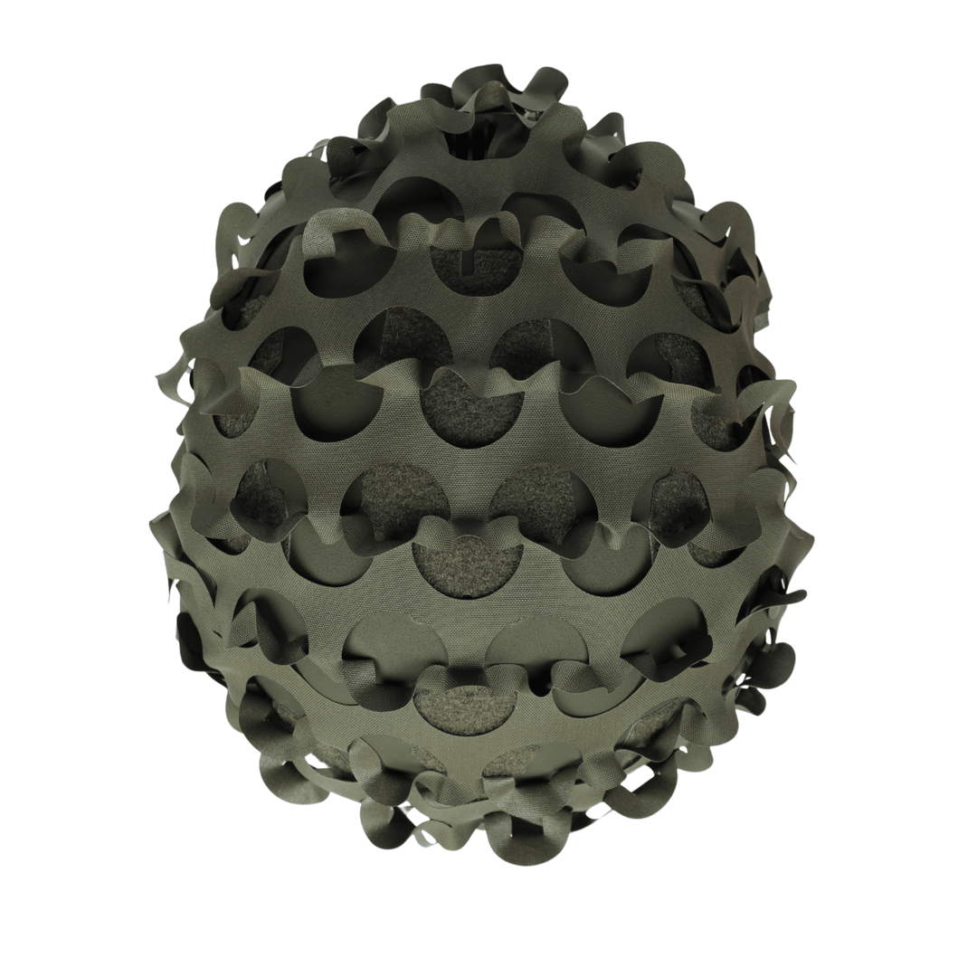 The OPE Gear Helmet Scrim - Camo Helmet Cover by OPE Gear is a dark green, spherical cover with interlocking, curved cutouts resembling camouflage and revealing a textured inner surface for a geometric, abstract look.