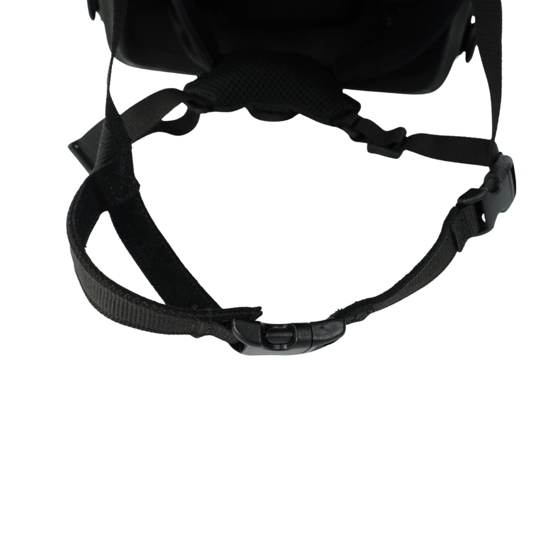 Close-up of the Premier Body Armor Fortis Ballistic Helmet Chin Strap Extender—gas mask compatible—showing its black adjustable strap with plastic buckle, attached to fabric against a white background.