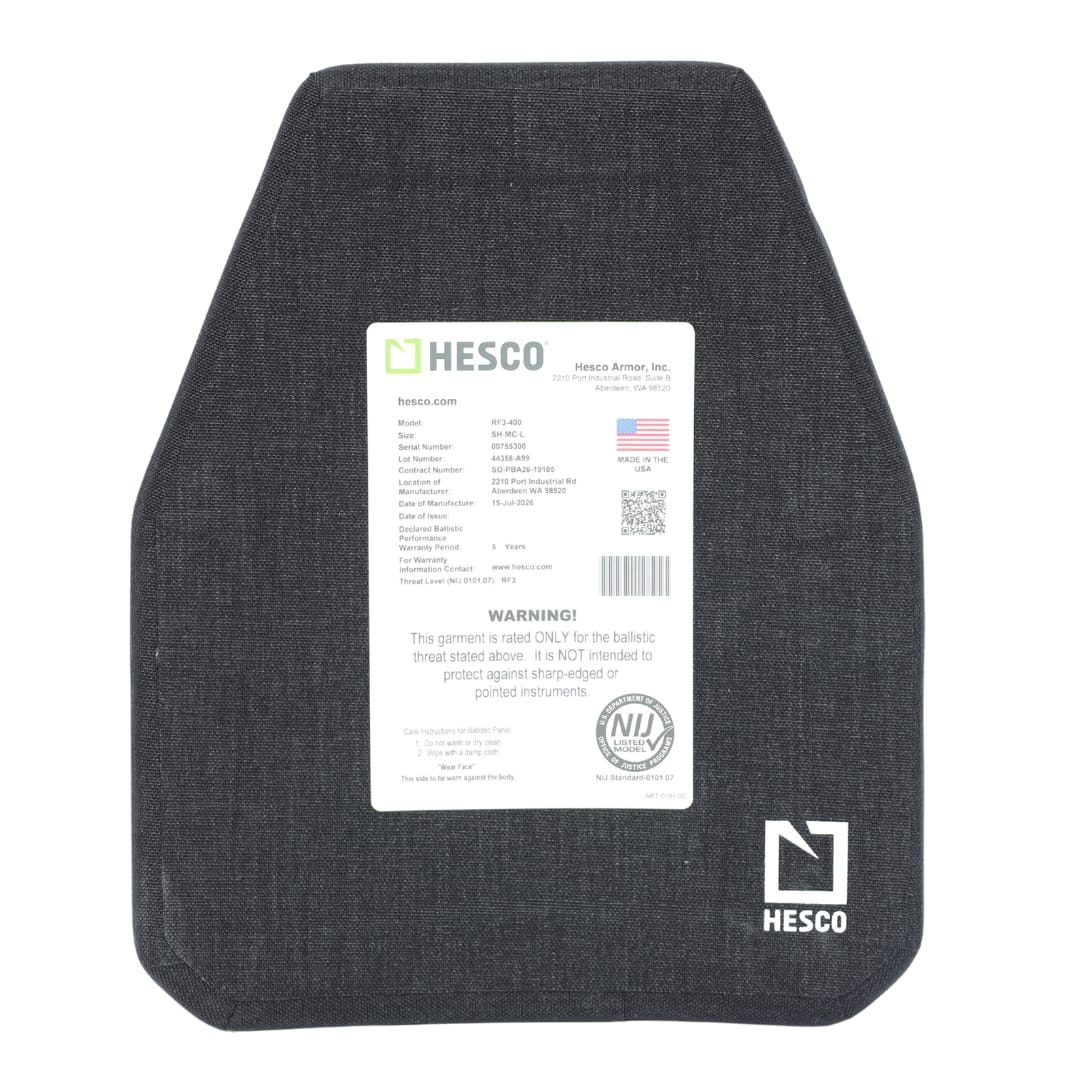 A black Hesco RF3-400 ballistic armor plate with a white label displaying specifications, manufacturer details, an American flag, and safety warnings, positioned on a plain white background. This ceramic/composite armor plate offers light AP protection while maintaining a sleek design.