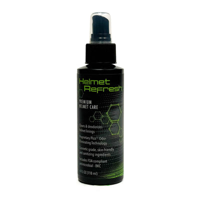 A black Molecule Helmet Refresh Spray bottle with green and white text sits on a white background. The label highlights its deodorizing and odor-removal features, making it an effective helmet deodorizer. The bottle is topped with a spray nozzle.