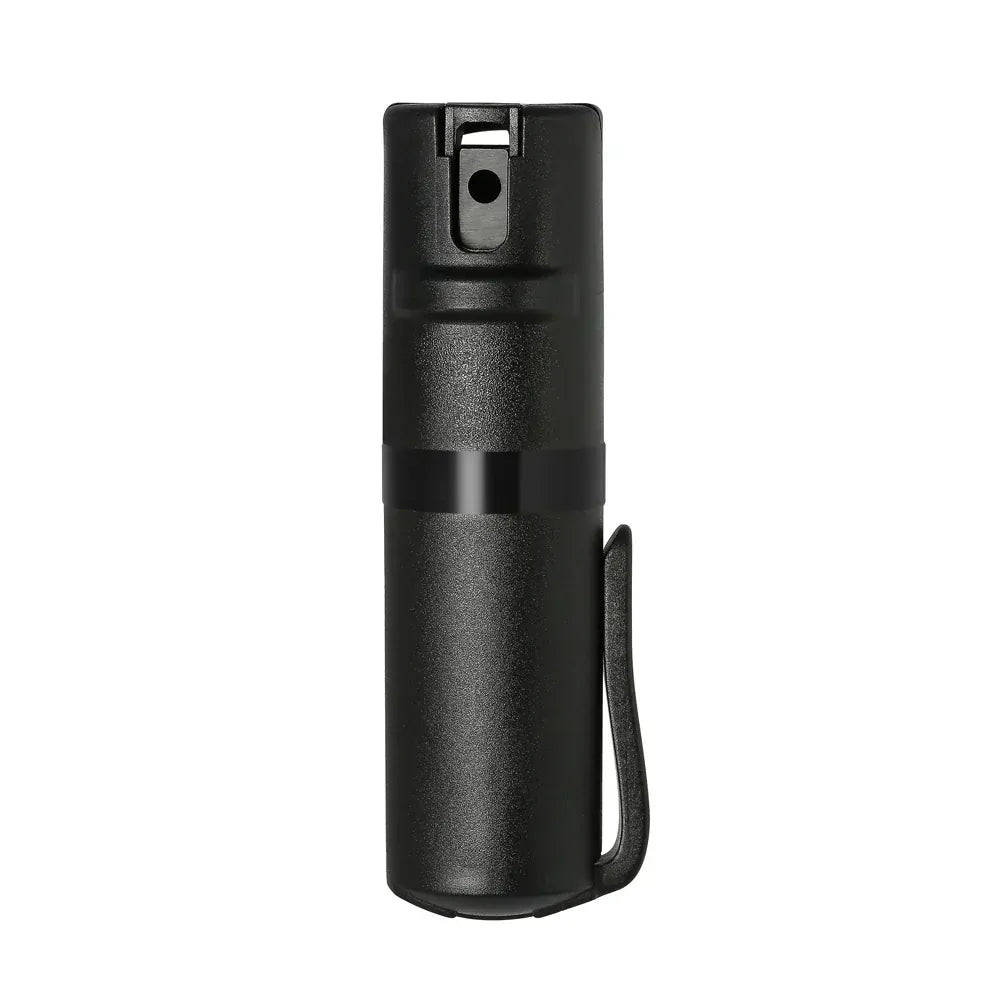 The POM Clip Pepper Spray by POM is a compact EDC self-defense tool. This small black canister features a safety nozzle and side clip, and stands upright against a plain white background.