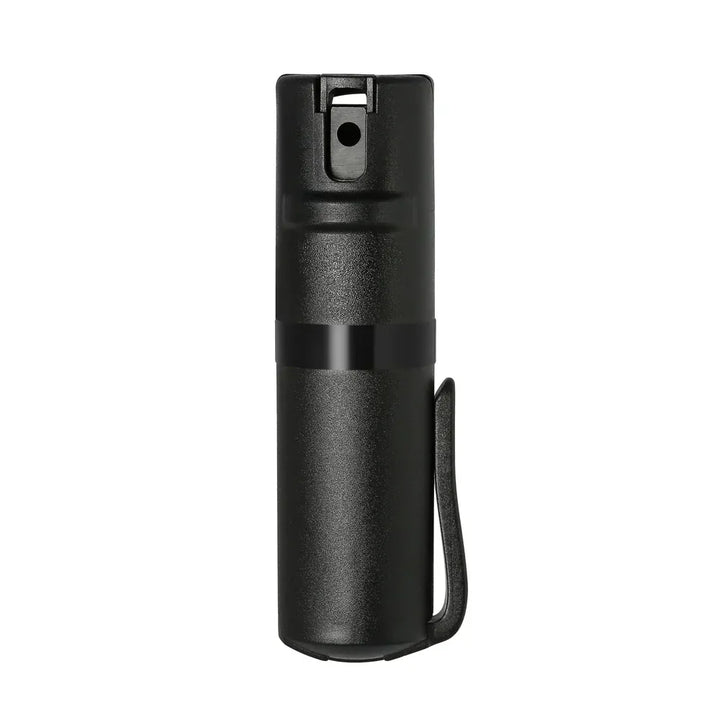 The POM Clip Pepper Spray by POM is a compact EDC self-defense tool. This small black canister features a safety nozzle and side clip, and stands upright against a plain white background.
