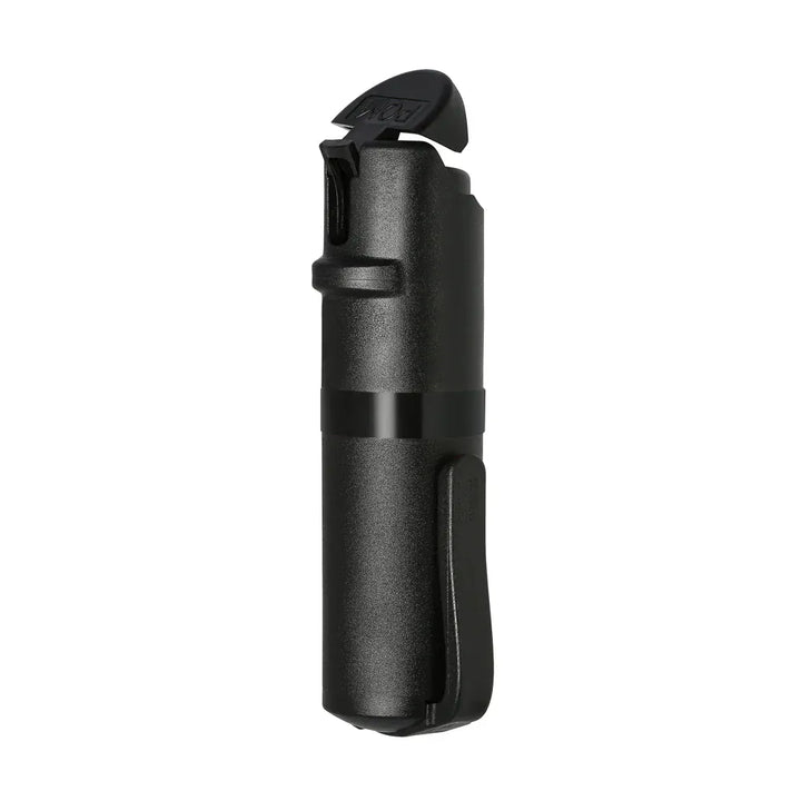 The POM Clip Pepper Spray by POM is a compact, black, cylindrical canister with a curved safety cap and side clip, designed for EDC self-defense. It stands upright against a white background.