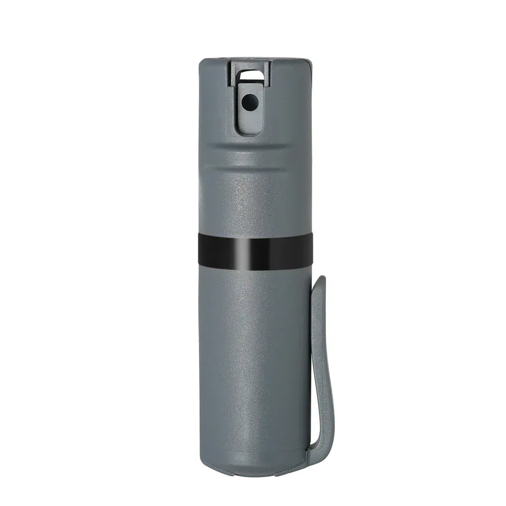 The POM Clip Pepper Spray by POM is a compact gray cylindrical canister with a black band and side pocket clip, shown upright against a white background.