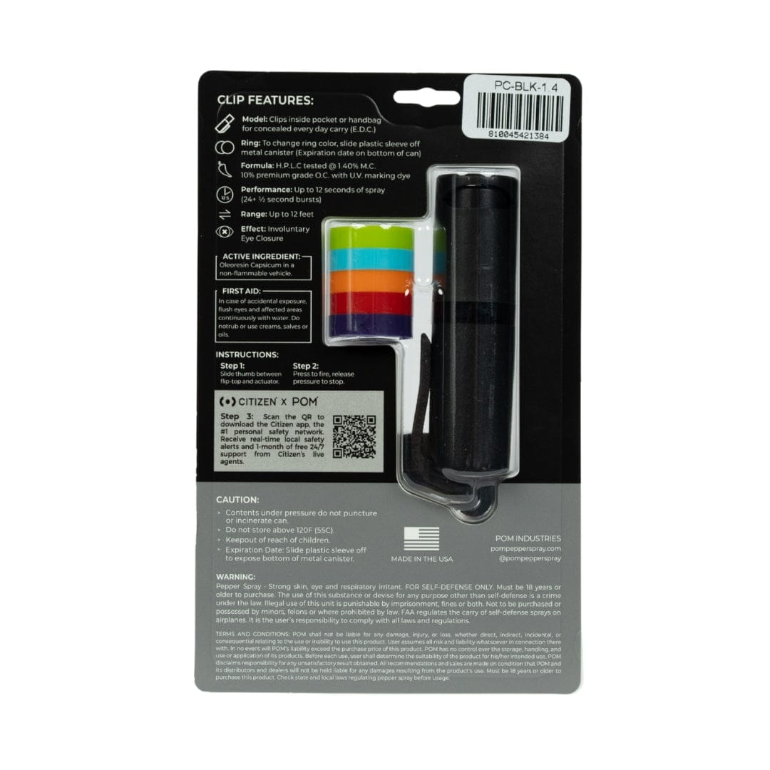 Back of a POM Clip Pepper Spray package shows listed features, instructions, and warnings. The package displays a compact black canister with a clip and multi-colored identification ring, branded by POM.