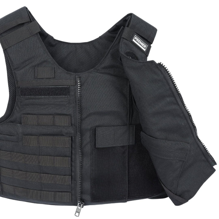 The Premier Body Armor Patrol Charlie vest is displayed in black with one side unzipped, showing interior pockets and compartments. It features straps, Velcro patches, and exterior scalability for Level IIIA soft armor.