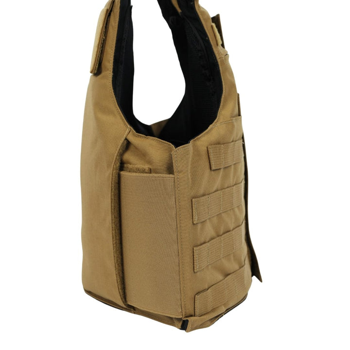 The Premier Body Armor Patrol Foxtrot is a tan overt patrol vest with front MOLLE rows, large side pocket, and plate pockets, shown upright against a white background.