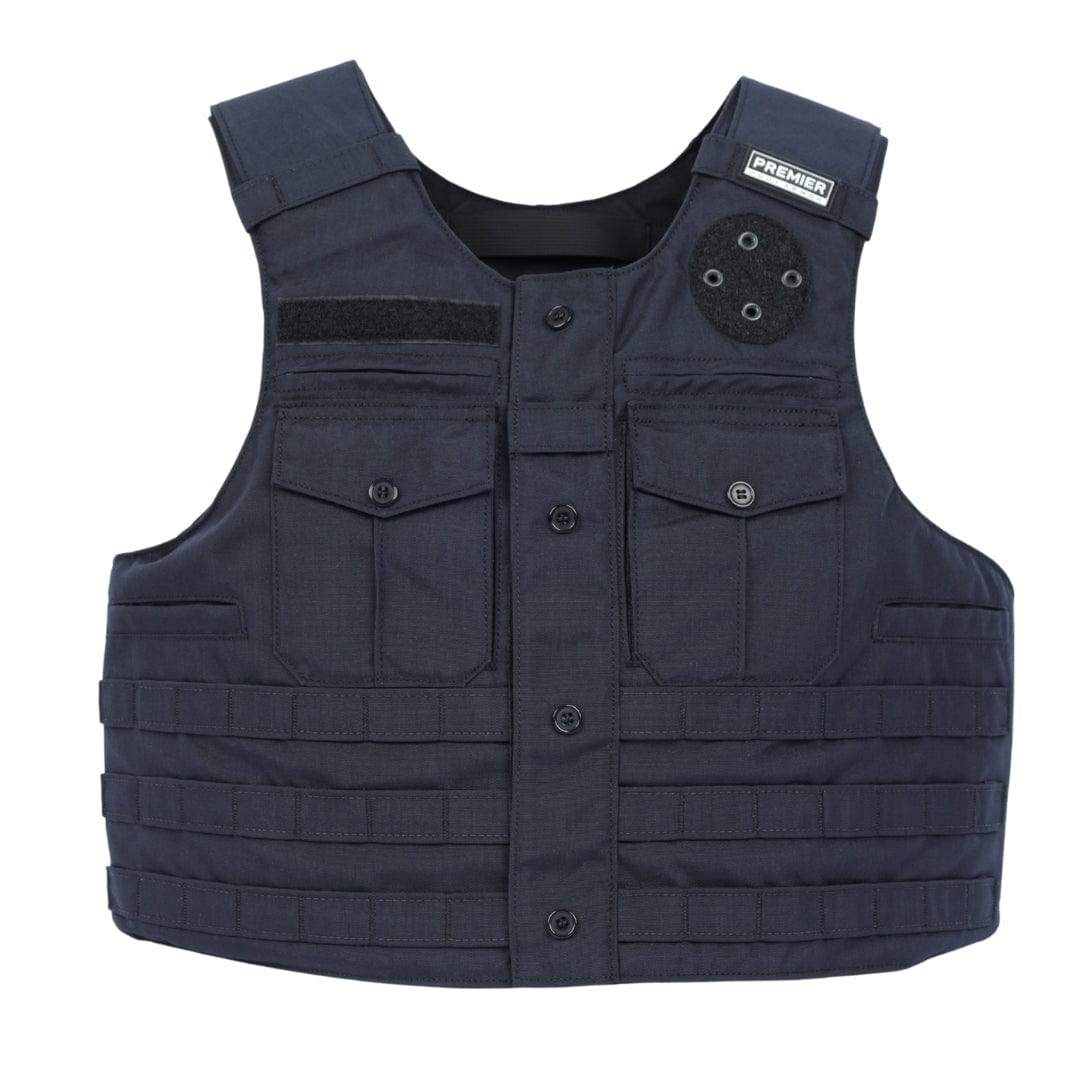 The Patrol Golf vest by Premier Body Armor features a dark blue color, front pockets, button closures, and horizontal webbing for attachments. A small "Premier" patch on the upper right shoulder adds practical style for law enforcement use.