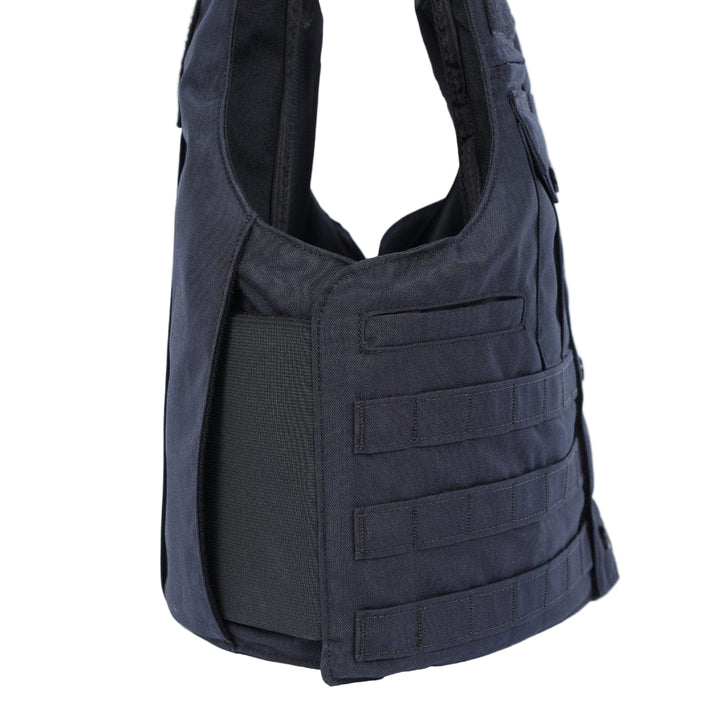 The Premier Body Armor Patrol Golf is a black vest featuring multiple rows of horizontal webbing, visible shoulder straps, and a side panel—perfect for law enforcement—shown against a plain white background.