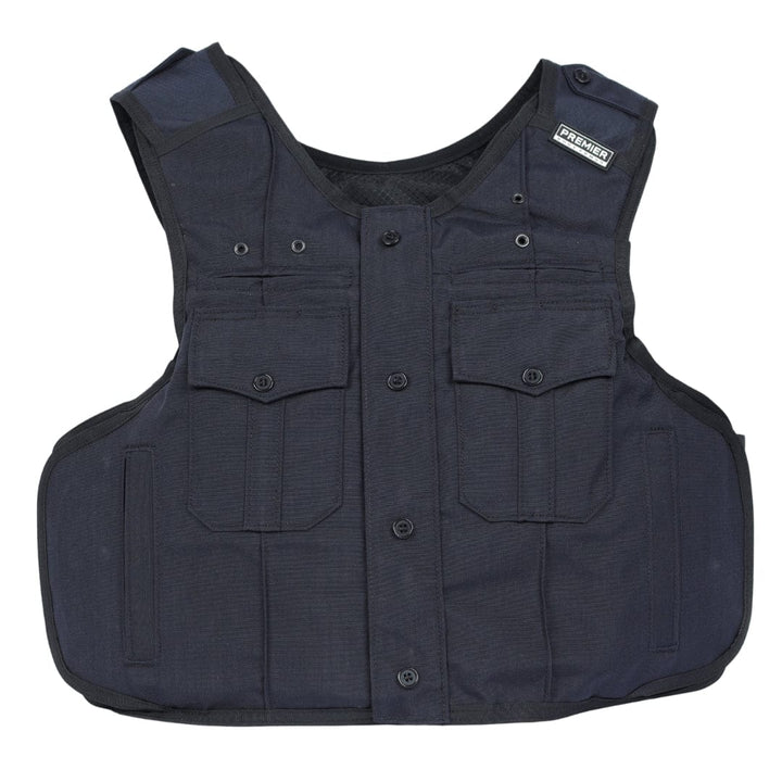 A black Patrol India overt carrier vest by Premier Body Armor, featuring multiple front pockets, buttons, and a Premier label on the right shoulder, laid flat on a white background.