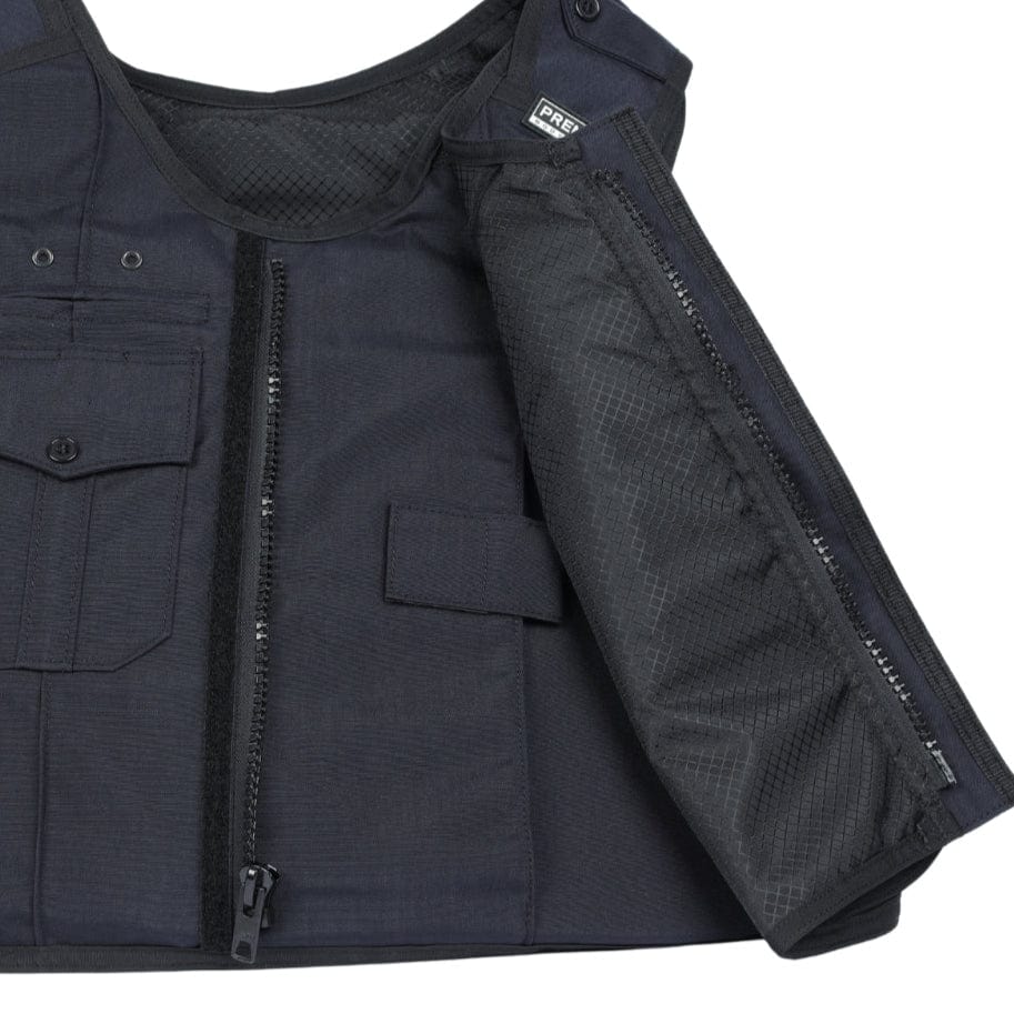 A close-up of a partially unzipped Premier Body Armor Patrol India vest, made in the USA, showing its Level IIIA protection, mesh lining, exterior pockets, and Velcro fastening strips.