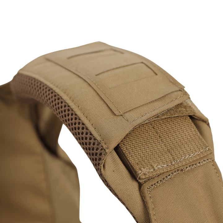 Close-up of the Fortis Shoulder Pads by Premier Body Armor, featuring a tan-colored strap with reinforced stitching, breathable mesh padding, and Velcro patches for easy attachment. The durable fabric is designed for heavy-duty applications, making these pads an excellent option for law enforcement personnel—particularly those who can take advantage of a special law enforcement discount.