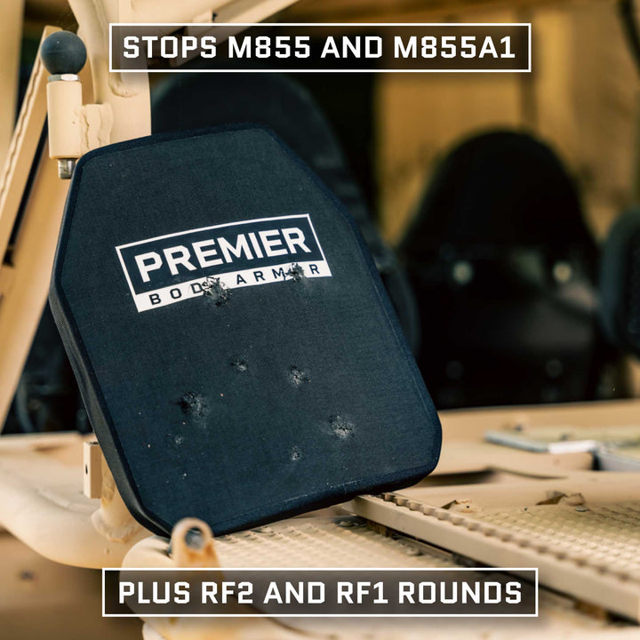 A black body armor plate labeled "Premier Body Armor" sits on a beige background. The text above it reads "Stops M855 and M855A1," while the text below reads "Plus RF2 and RF1 Rounds." Ideal for tactical professionals, this Fortis Level III+ GT Loadout offers superior ballistic protection with visible impact marks from rigorous testing.