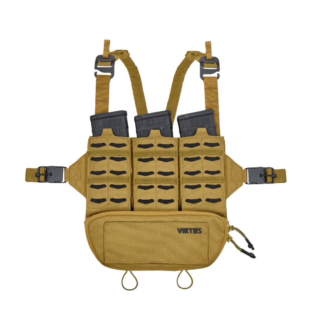 The image displays a tan Viktos Taculus MX Chest Rig, equipped with a front pouch, adjustable shoulder straps, and side straps. It features MOLLE webbing and three black rifle magazine pouches. The brand logo "VIKTOS" is visible on the lower right side of the pouch, making it ideal for tactical operations.