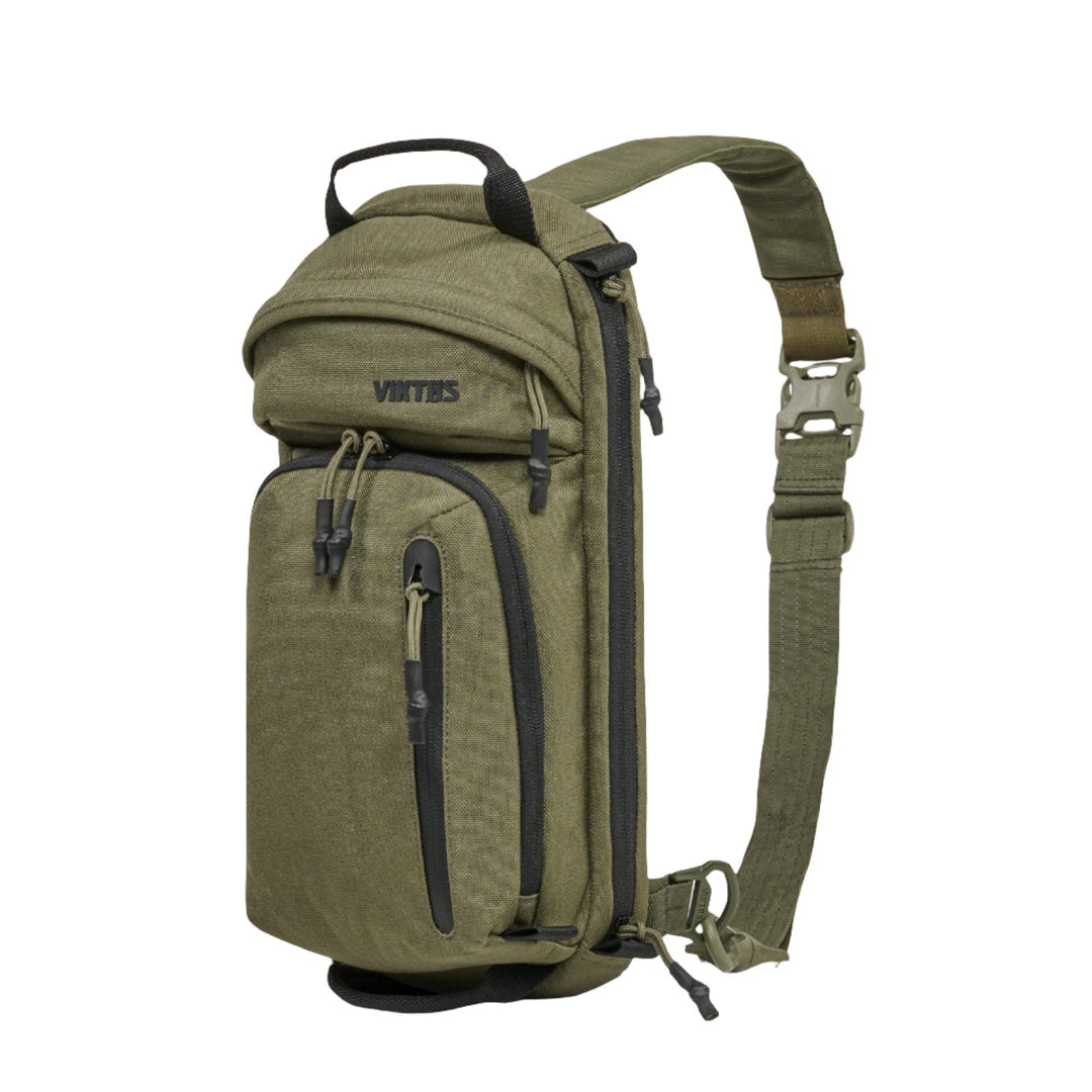 A compact, green Viktos Upscale3 Slingbag with multiple zippered compartments. The brand name "Viktos" is embroidered on the upper section. The bag features an adjustable strap with a buckle for securing and a top handle for carrying, offering options for concealed carry and body armor inserts.