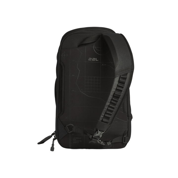 The Vertx Gamut 22L Sling by Vertx is a black, rectangular EDC backpack with a wide padded strap and map-inspired grid pattern on the front, shown against a white background. With closed zippers, it's travel-friendly and designed for everyday carry.
