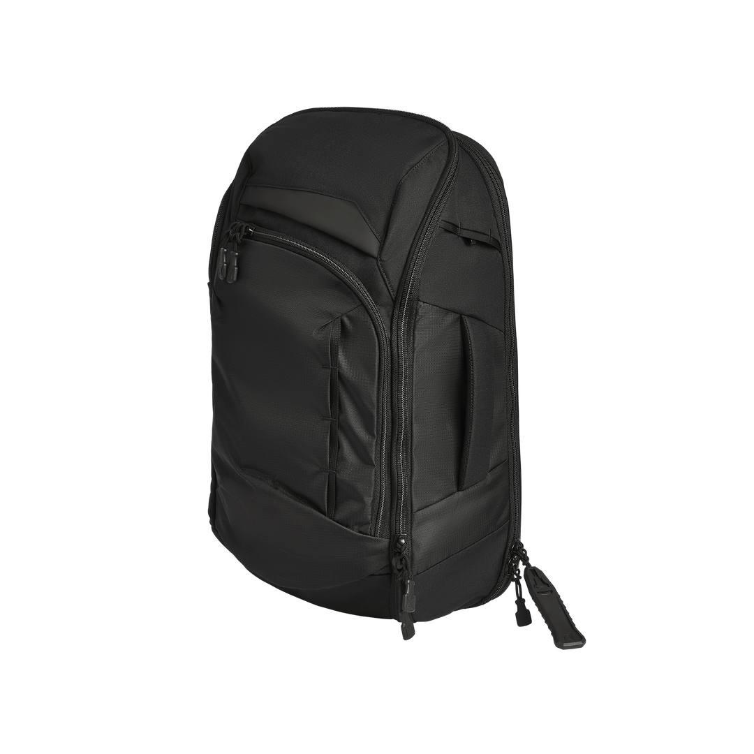 The Vertx Gamut 22L Sling by Vertx is a black backpack with multiple zippered compartments, including a dedicated CCW compartment and a sleek, minimalist design, shown upright against a plain white background.