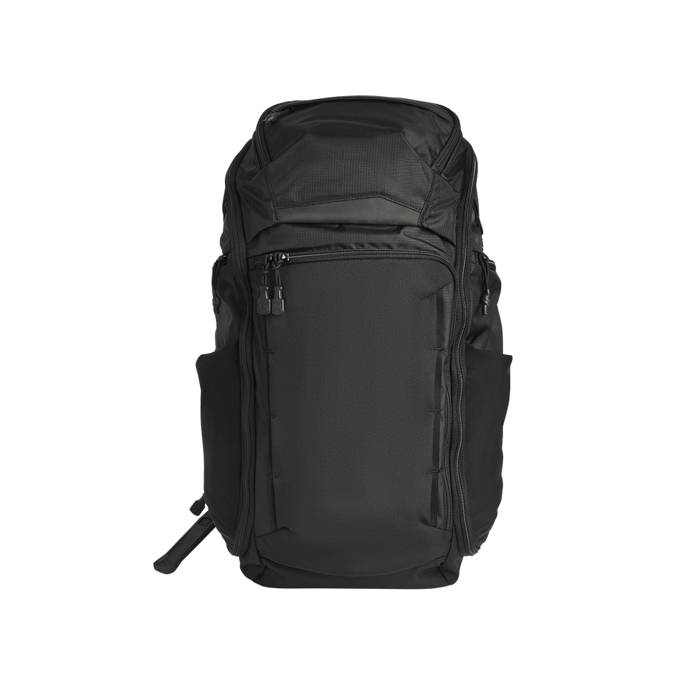 The Vertx Gamut 32L Pack by Vertx is a black EDC backpack featuring a top handle, multiple zippered compartments, and side pockets, shown against a plain white background.