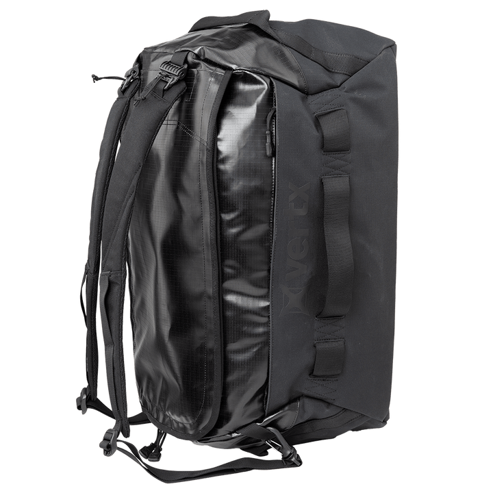 The Vertx RLT Duffel by Vertx boasts a robust build with various handles and adjustable shoulder straps. Its elegant design, highlighted by a glossy front panel, provides customizable storage options while ensuring ample interior space.